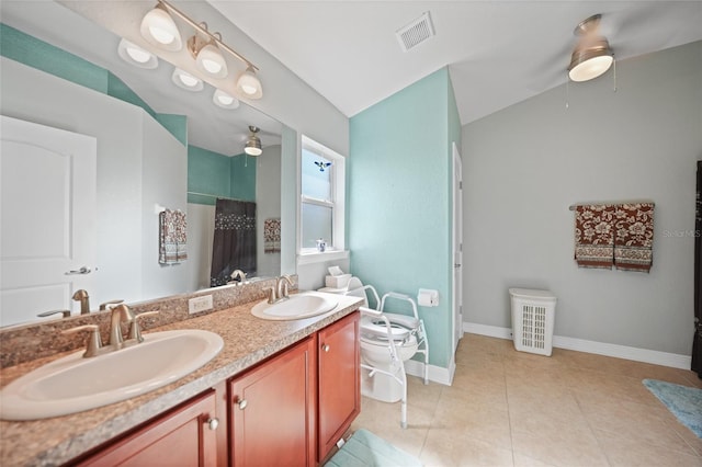 full bath featuring a sink, visible vents, baseboards, and tile patterned flooring