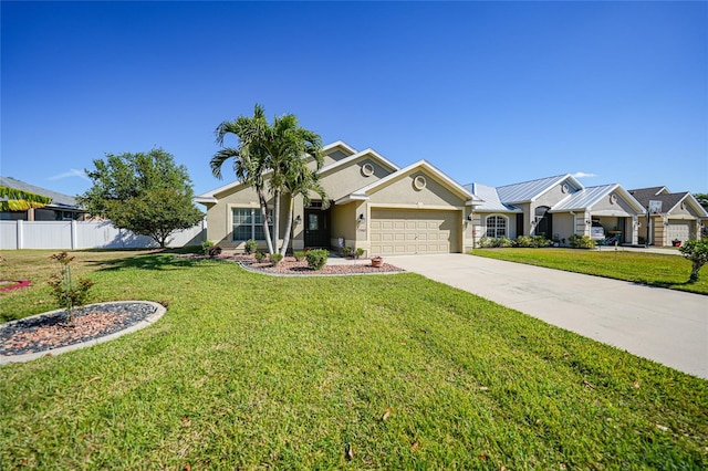 ranch-style home featuring a garage, concrete driveway, stucco siding, and fence