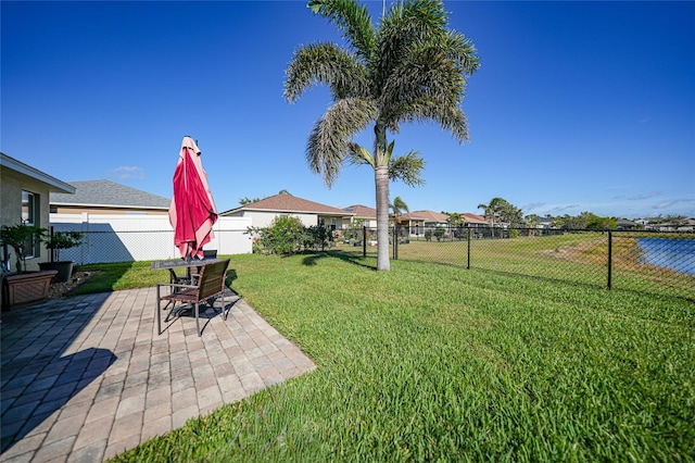 view of yard with a patio and a fenced backyard