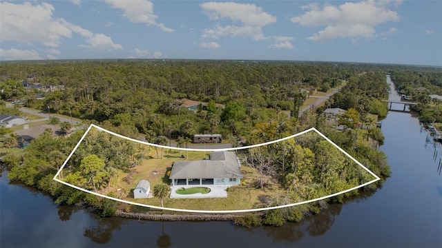 535 Ramblewood St, Port Charlotte, FL 33953 - birds eye view of property with a water view and a view of trees