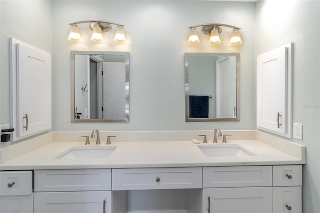 535 Ramblewood St, Port Charlotte, FL 33953 - bathroom with double vanity and a sink
