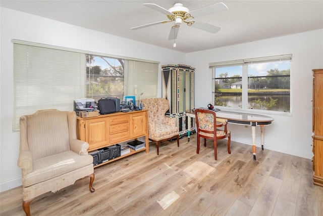 535 Ramblewood St, Port Charlotte, FL 33953 - office with light wood finished floors, baseboards, and a ceiling fan