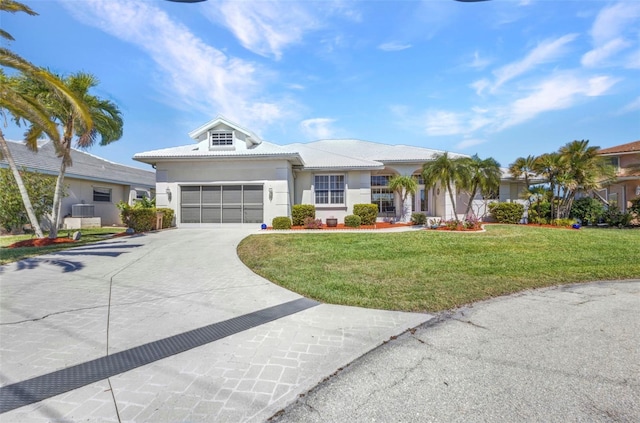 412 Panarea Dr, Punta Gorda, FL 33950 - ranch-style home with concrete driveway, a front yard, and stucco siding