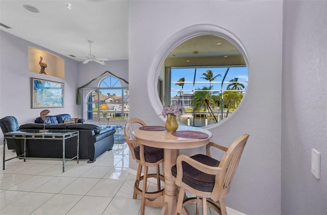 412 Panarea Dr, Punta Gorda, FL 33950 - dining space with light tile patterned flooring, visible vents, baseboards, and ceiling fan
