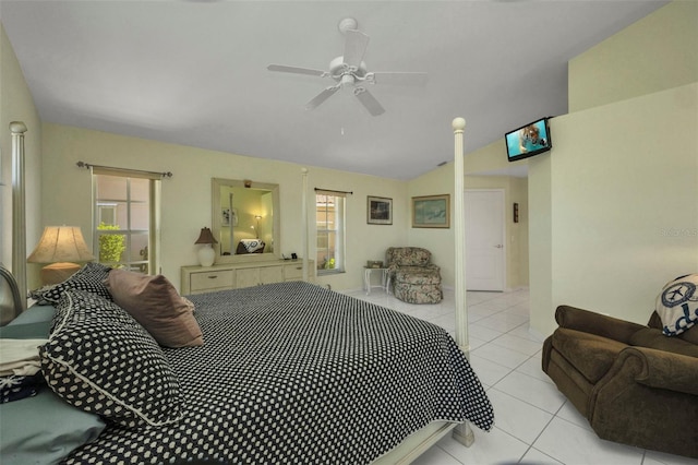 412 Panarea Dr, Punta Gorda, FL 33950 - bedroom featuring lofted ceiling, multiple windows, light tile patterned flooring, and ceiling fan