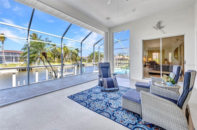 412 Panarea Dr, Punta Gorda, FL 33950 - sunroom / solarium featuring outdoor lounge area, a ceiling fan, and a water view