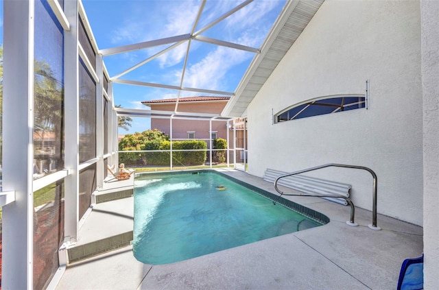 412 Panarea Dr, Punta Gorda, FL 33950 - outdoor pool featuring glass enclosure and a patio
