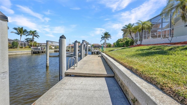 412 Panarea Dr, Punta Gorda, FL 33950 - view of dock featuring a lawn and a water view