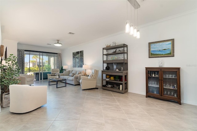 living area with light tile patterned floors, ornamental molding, baseboards, and visible vents