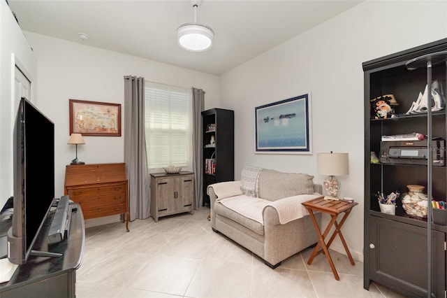 living area with light tile patterned flooring