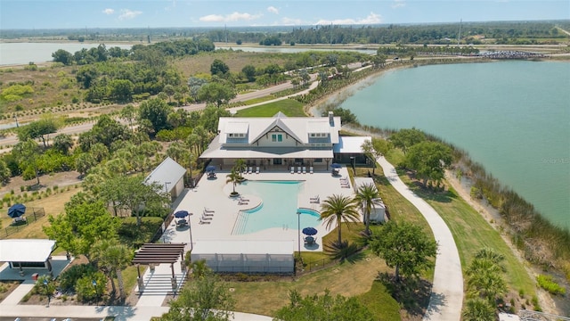 birds eye view of property featuring a water view