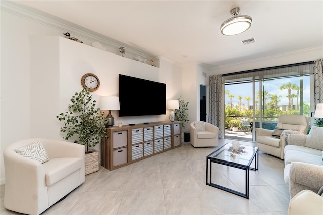 living room with ornamental molding and visible vents