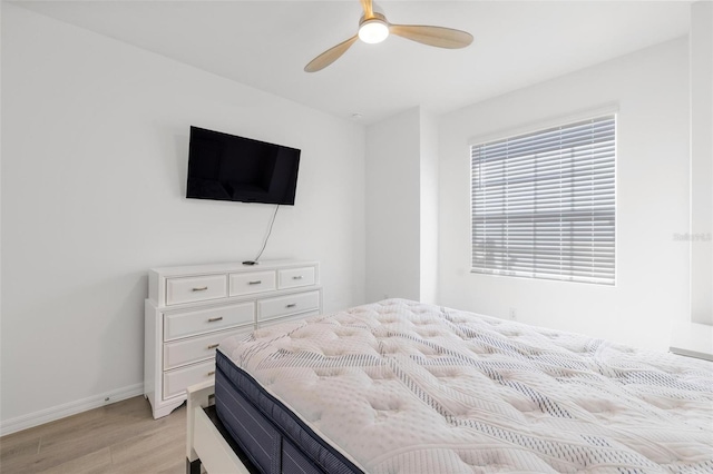 15931 Sugar Hill Dr, Punta Gorda, FL 33982 - bedroom featuring light wood finished floors, baseboards, and a ceiling fan