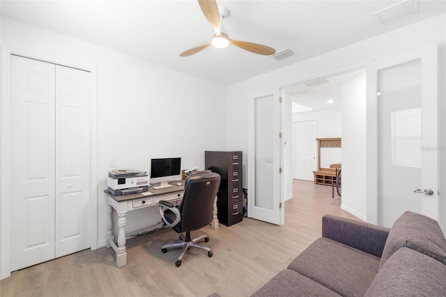 15931 Sugar Hill Dr, Punta Gorda, FL 33982 - home office featuring visible vents, baseboards, light wood finished floors, and a ceiling fan