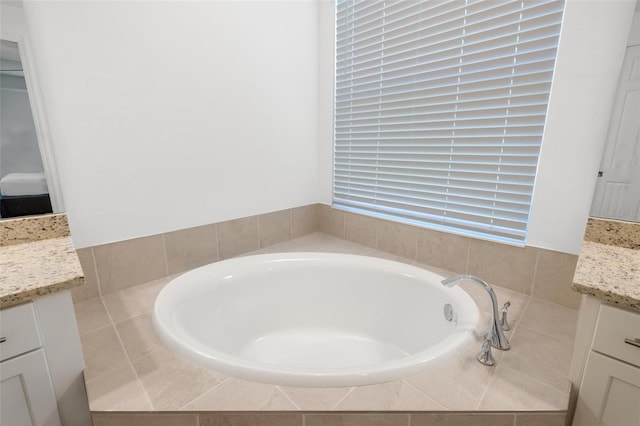 15931 Sugar Hill Dr, Punta Gorda, FL 33982 - bathroom featuring vanity and a garden tub