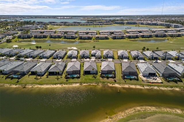 15931 Sugar Hill Dr, Punta Gorda, FL 33982 - birds eye view of property with a water view, a residential view, and golf course view