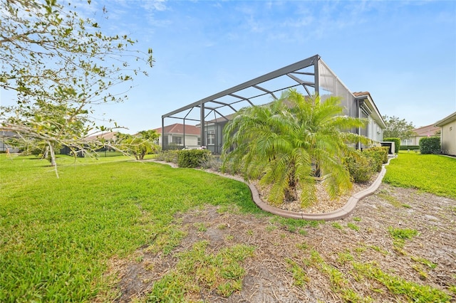 view of yard with a lanai