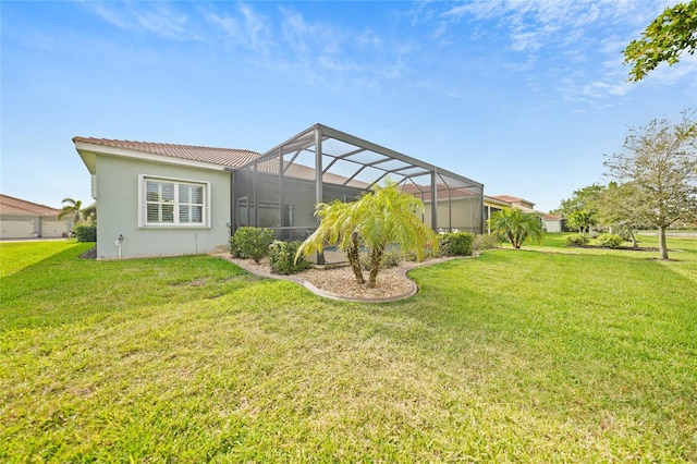 view of yard featuring glass enclosure