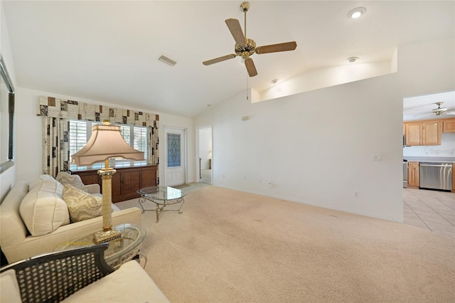 3753 Aba Ln, North Port, FL 34287 - living area featuring a ceiling fan, vaulted ceiling, light carpet, and recessed lighting