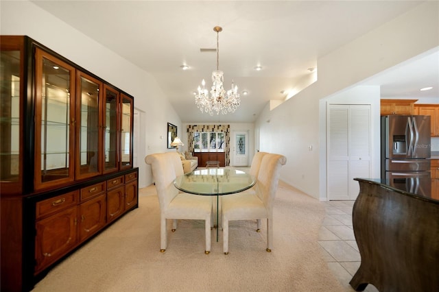 3753 Aba Ln, North Port, FL 34287 - dining room with a chandelier, vaulted ceiling, light carpet, light tile patterned floors, and recessed lighting