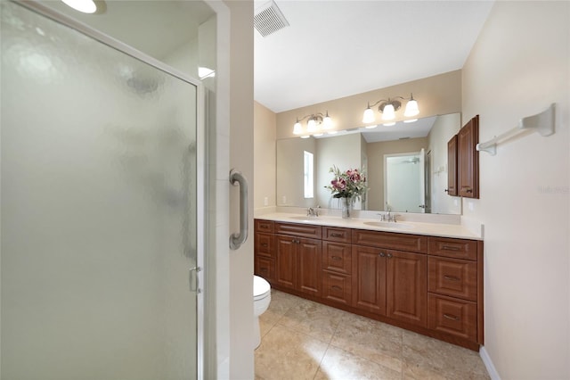 3753 Aba Ln, North Port, FL 34287 - full bathroom with double vanity, a shower stall, and tile patterned flooring