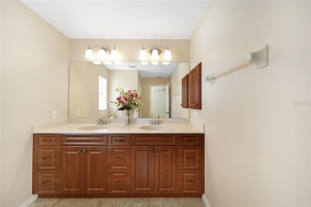 3753 Aba Ln, North Port, FL 34287 - bathroom with double vanity and baseboards