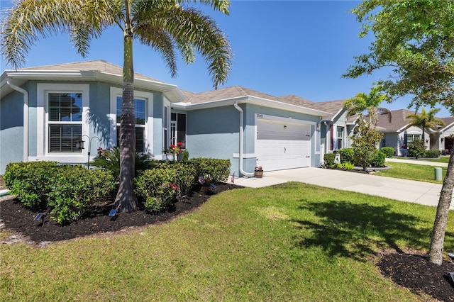 ranch-style house featuring a garage, stucco siding, concrete driveway, and a front yard
