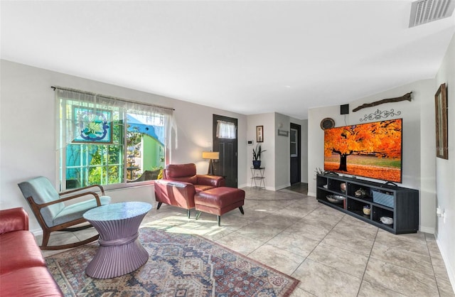 living room featuring baseboards