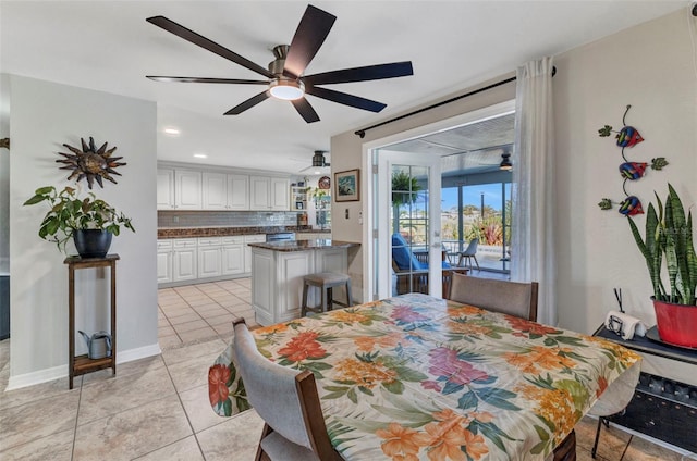 dining area with ceiling fan, light tile patterned floors, recessed lighting, and baseboards