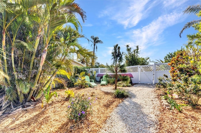 view of yard with a gate and fence