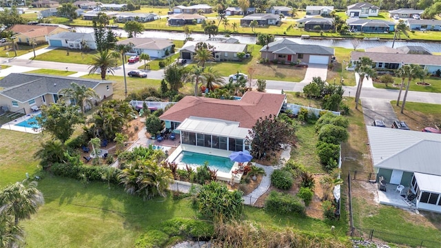 aerial perspective of suburban area with a pool area