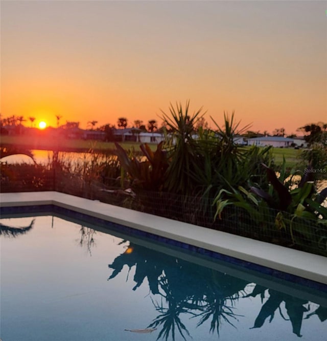 view of pool with fence