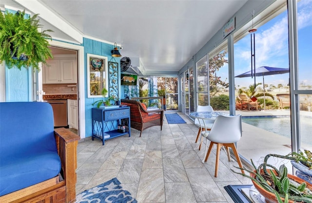 sunroom / solarium with plenty of natural light