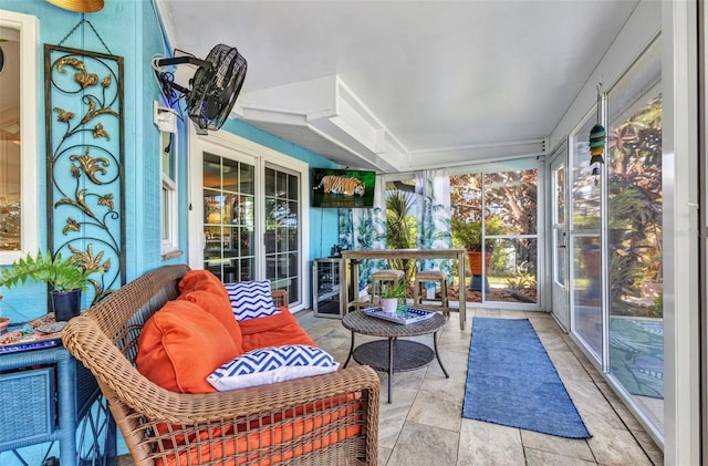 sunroom / solarium with outdoor lounge area