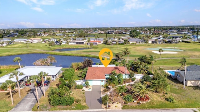 aerial perspective of suburban area with a large body of water and a golf club