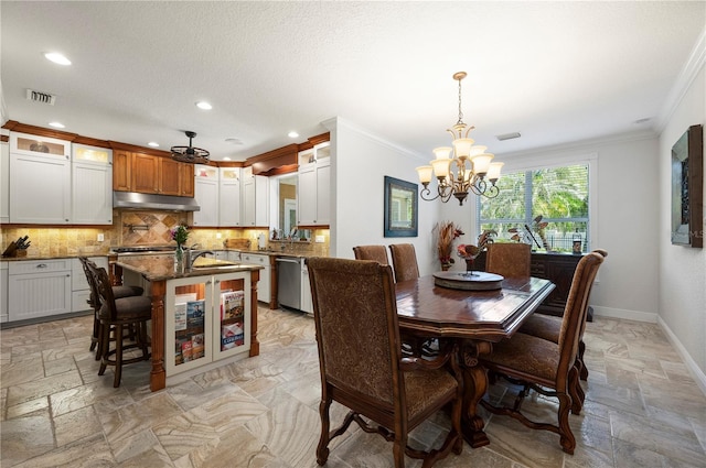9990 SW Peace River St, Arcadia, FL 34269 - dining space featuring ornamental molding, a chandelier, stone tile flooring, recessed lighting, and ceiling fan