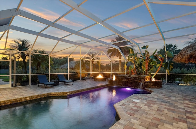 9990 SW Peace River St, Arcadia, FL 34269 - swimming pool with a patio area and glass enclosure
