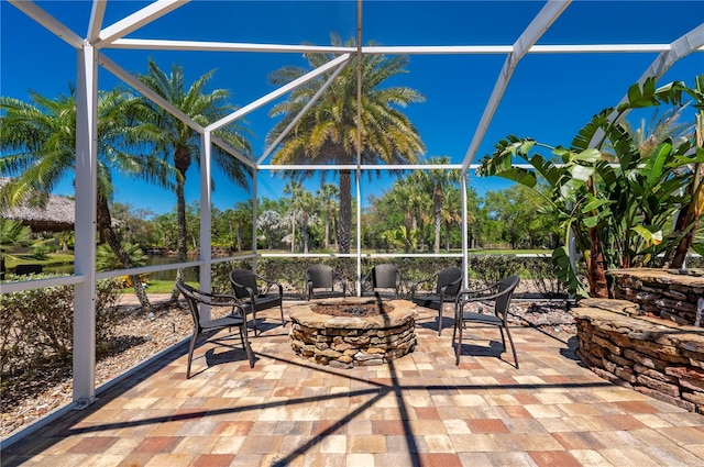 9990 SW Peace River St, Arcadia, FL 34269 - view of patio with a fire pit and a lanai
