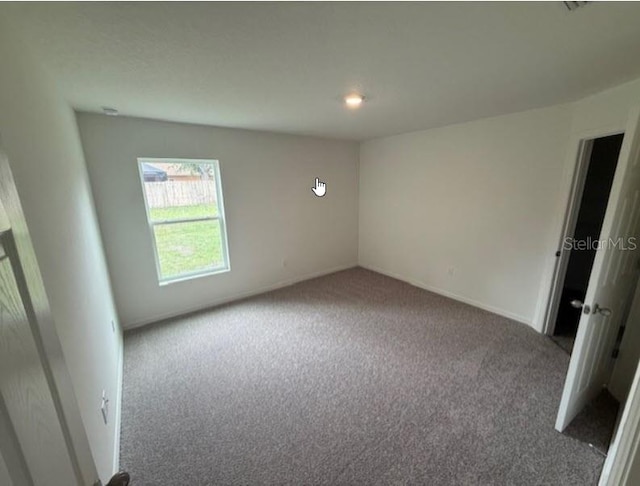 12 Royal Leaf Ln, Palm Coast, FL 32164 - empty room with carpet