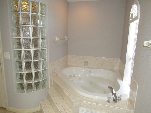 bathroom featuring a whirlpool tub