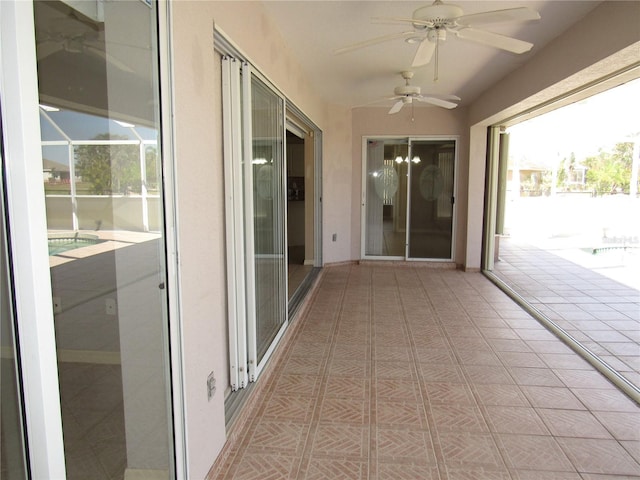 exterior space featuring ceiling fan