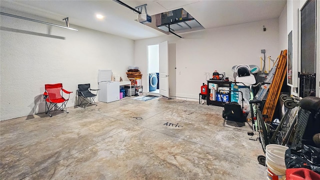 garage featuring a garage door opener