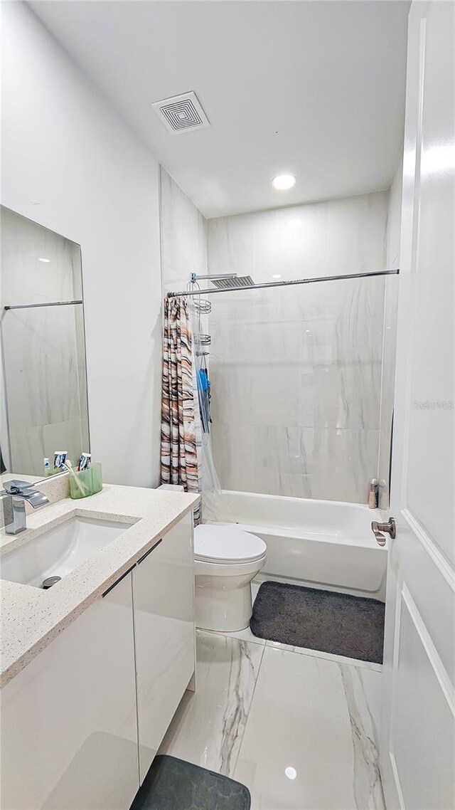 full bath with visible vents, marble finish floor, toilet, vanity, and shower / bathtub combination with curtain