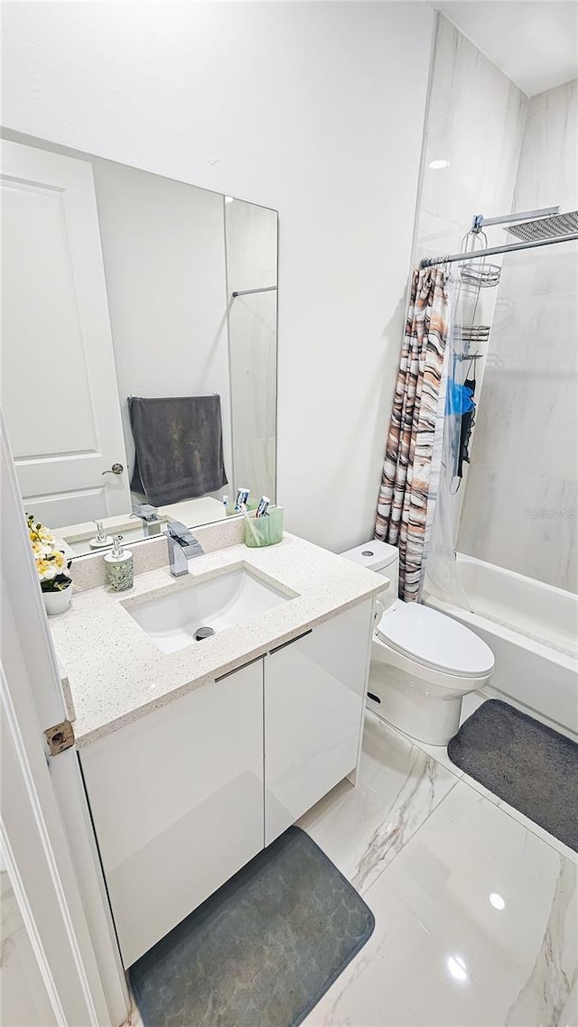 bathroom featuring marble finish floor, toilet, vanity, and shower / bath combination with curtain