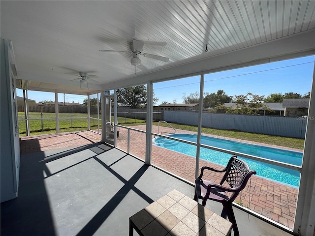 view of swimming pool featuring a fenced backyard, a ceiling fan, a patio, and a fenced in pool