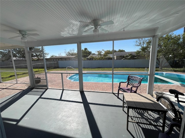 view of pool with a patio, fence, a fenced in pool, and ceiling fan