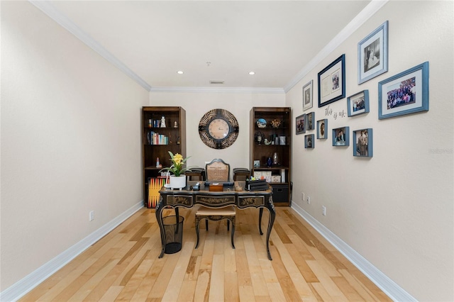 home office featuring crown molding, recessed lighting, baseboards, and light wood finished floors