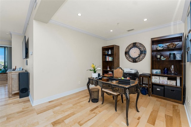 office space featuring crown molding, baseboards, recessed lighting, and light wood-style flooring