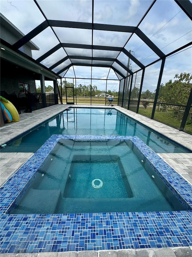 22223 Seyburn Ter, Port Charlotte, FL 33954 - view of pool with a lanai, a patio, and a pool with connected hot tub