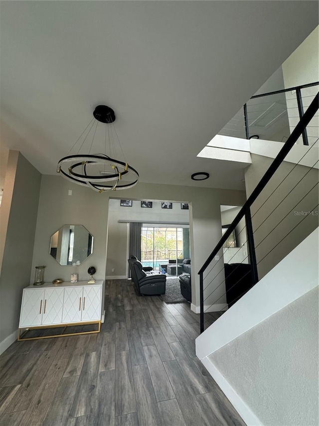 22223 Seyburn Ter, Port Charlotte, FL 33954 - interior space with wood finished floors, an inviting chandelier, baseboards, and stairway